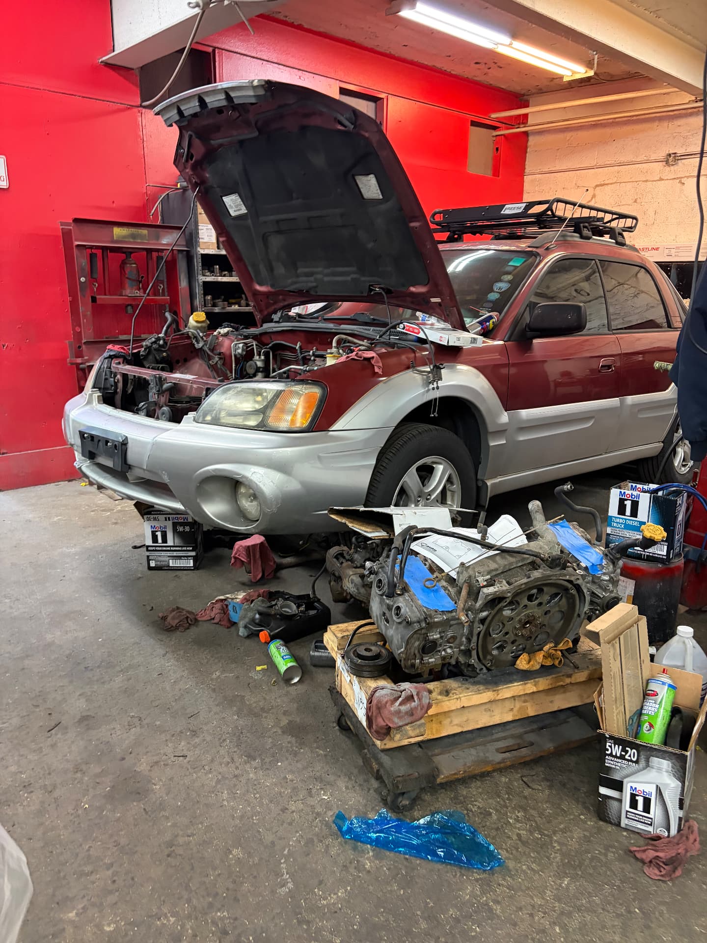 Subaru Baja with the engine pulled and set on a pallet